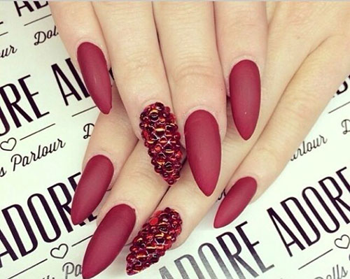 red acrylic nails with gems